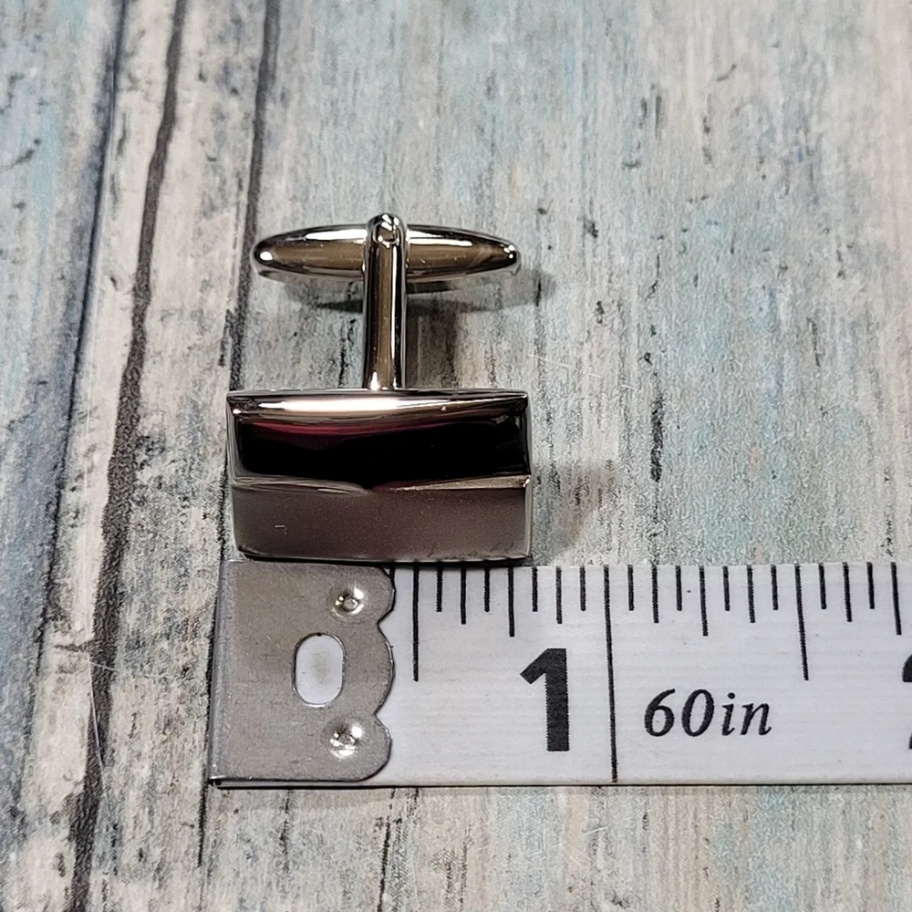 Cuff Links and Tie clip.